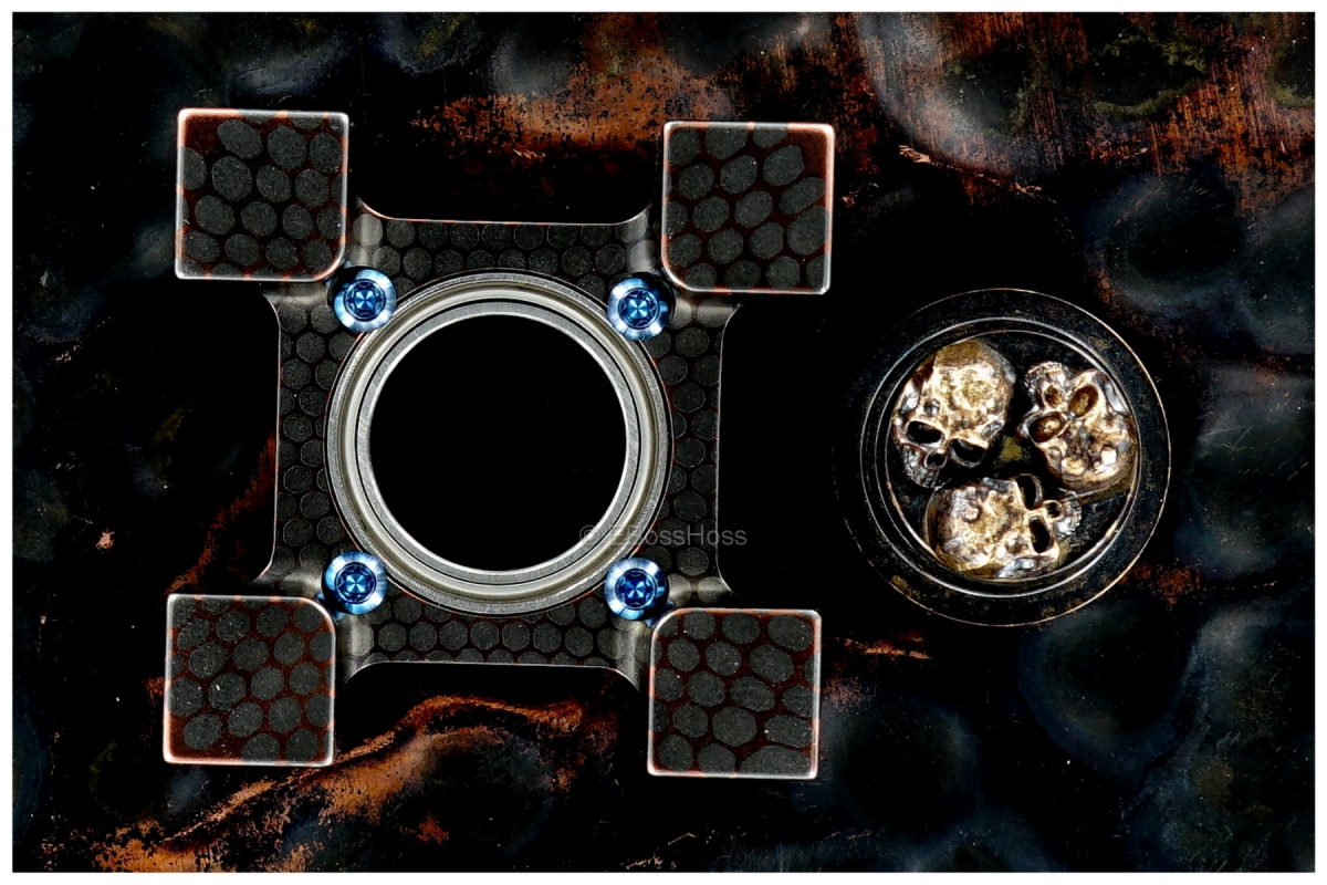 Steel Flame Deluxe Super-Conductor XL Ring Spin with Pile of Skulls Plug