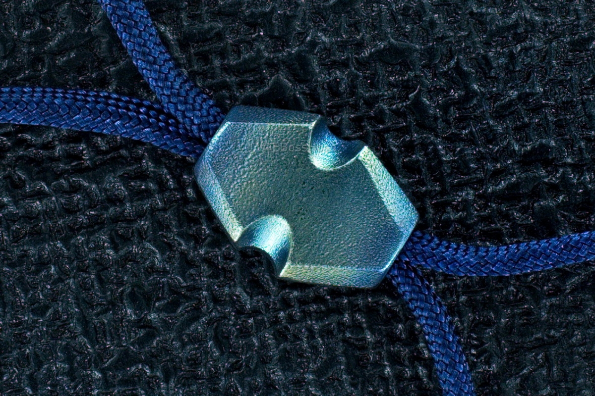 A Pair of Rick Lala (Korth) Hand-ground Titanium Beads