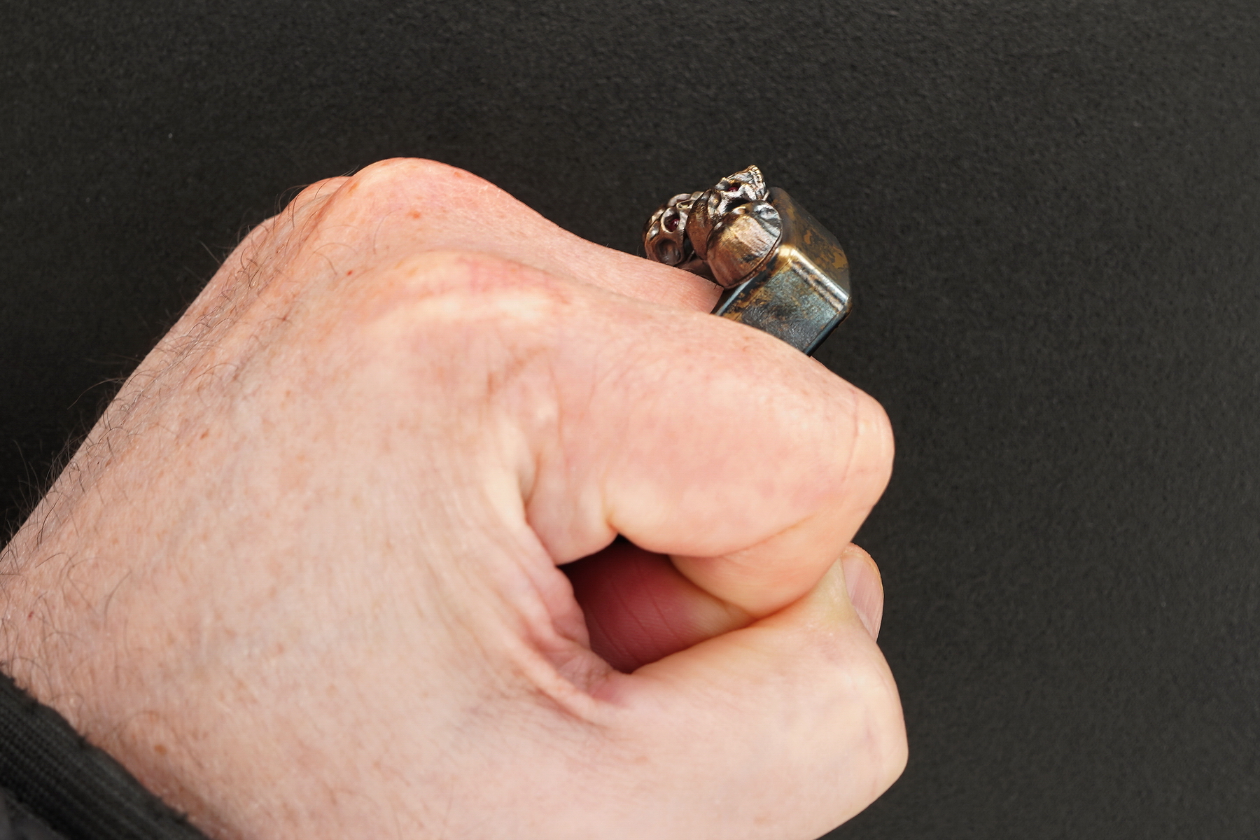 Steel Flame Custom Thick Pile of Skulls Ring